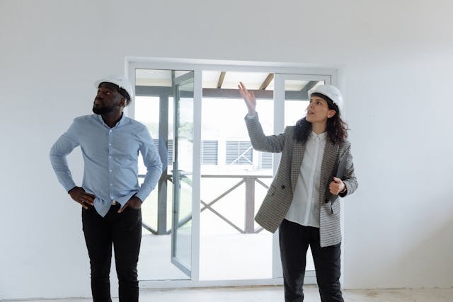 landlord and tenant inspecting a unit