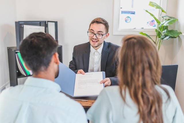 a mortgage broker presenting investors with different financing options