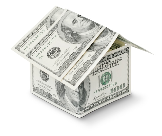 cash folded into the shape of a house to represent late fees