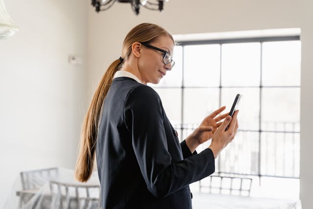 property manager working on a cell phone